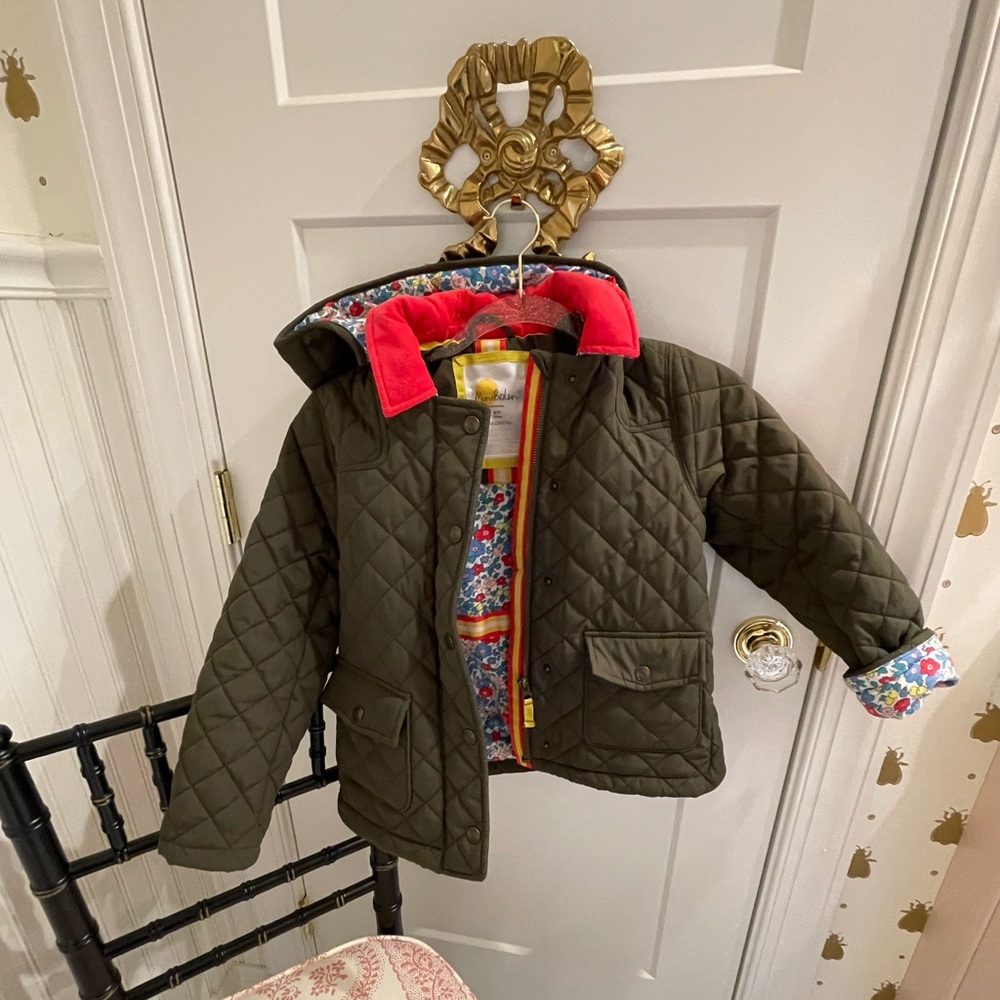 Mini Boden Quilted Jacket with Floral Lining and removable hood. Size 8-9Y.